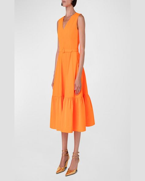 Akris punto taffeta midi dress features wrapeffect stitching and a flounce hemline     Vneckline    Sleeveless    Concealed back zip     Fitted waistline; adjustable belt     Side seam pockets     Hem hits around the knee    Aline silhouette    Polyester/cotton    Made in Romania