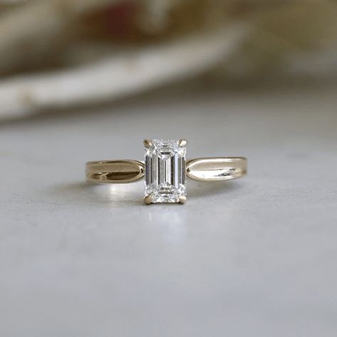 The Ada Engagement Ring gives off vintage flair with its low basket setting and tapered, inverted band. This ring can be set with any size or shape of center stone and is available in 14k or 18k yellow gold, white gold, rose gold or platinum. The price listed includes the setting only. Want more info? Book an appointment to sit down with one of our bridal experts virtually or in-store. Engagement Rings Gold Ban, Tapered Band Ring, Unique Square Cut Engagement Rings, Wide Shank Engagement Ring, Alternate Stone Wedding Rings, Rings Engagement Thick Band, Duchess Engagement Ring, Unique Engagement Ring Setting, Solid Band Engagement Ring