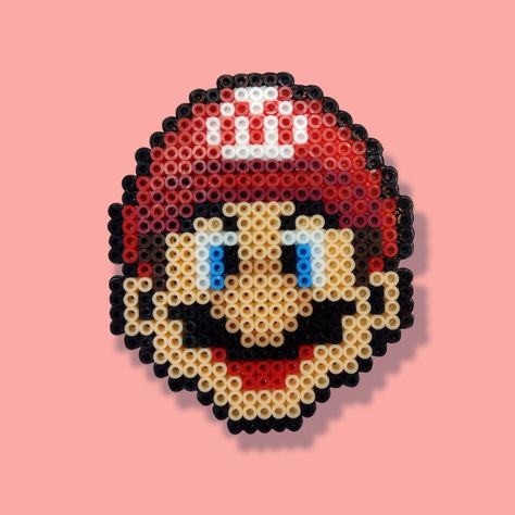 Mini hama bead Hama Beads Mario, Mini Hama Beads, Melty Bead Designs, Perler Bead Mario, Pixel Quilting, Hama Art, Hama Mini, Wild West Party, Easy Perler Beads Ideas