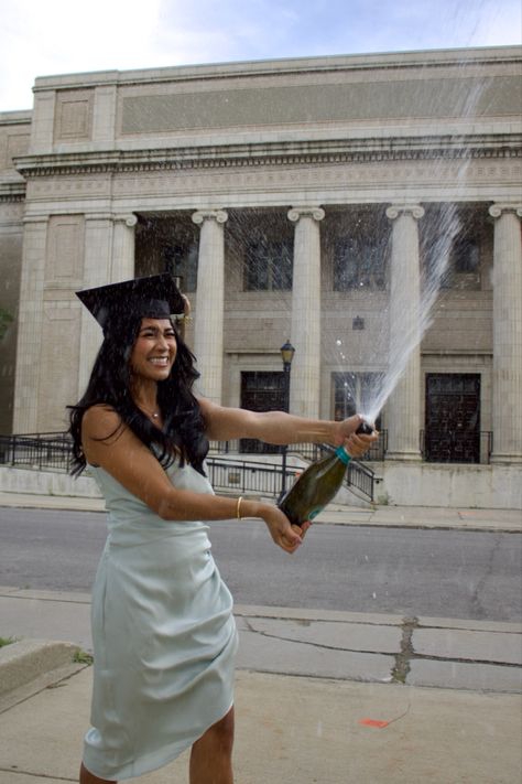 College Graduation Champagne Bottle, Poses With Champagne Bottle, Grad Pics Champagne, Central Park Graduation Pictures, Champagne Spray Graduation Photo, Grad Pic Ideas Photo Shoots, Champagne Spray Photo, Graduation Pictures Poses Photoshoot, Graduation Pictures Champagne