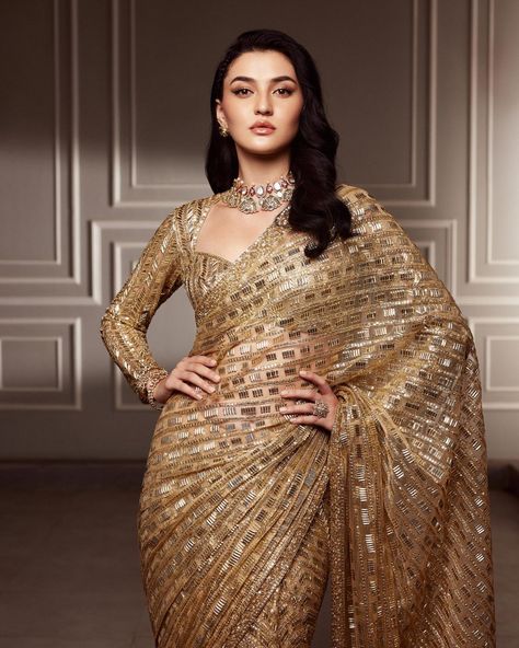 divine metallic gold tulle MY MM saree embellished with our signature sequins. Golden Saree For Reception Bride, Golden Saree Bride, Sequin Dress Indian, Golden Saree Look, Golden Sequin Saree, Metallic Saree, Manish Malhotra Saree, Golden Lehenga, Gold Saree