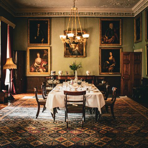 The dining room at Killerton House, Broadclyst was initially known as the Great Parlour and was elaborately decorated. This then became a library in the 19th century, complete with a hidden room. Sadly, the secret room has since been dismantled, but it’s mentioned in a contemporary account: ‘connected with this room is a private library and sitting-room, the entrance to which is through a bookcase, forming a hidden entrance.’ Then, this room was turned into the Aclands’ dining room during t... Dark Academia Dining Room, Victorian Sitting Room, Hidden Entrance, Victorian Dining Room, Kitchen Sitting Area, Hidden Room, Estate Gardens, Dining Room Victorian, Greenery Plants