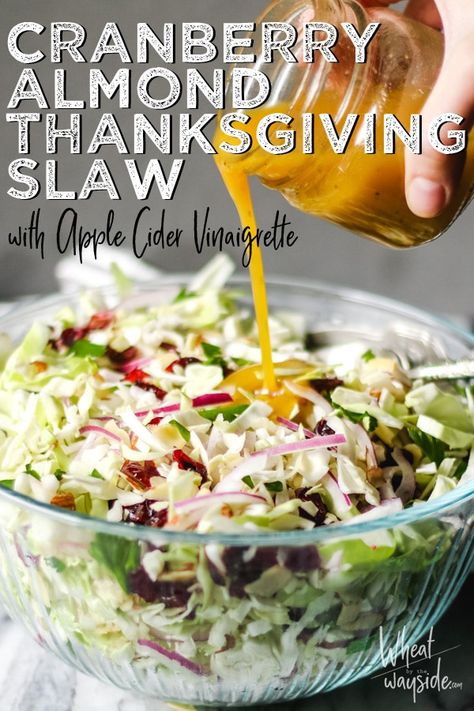 Cranberry Almond Slaw is tossed with an Apple Cider Vinaigrette.  It is light, refreshing, and the perfect addition to your Thanksgiving menu! #wheatbythewayside #thanksgiving #thanksgivingsides #vinegarslaw #slawrecipes Thanksgiving Slaw, Picnic Salads, Apple Cider Vinaigrette, Cider Vinaigrette, Thanksgiving Menu Ideas, Cranberry Almond, Thanksgiving Recipes Side Dishes, Beef Bourguignon, Slaw Recipes