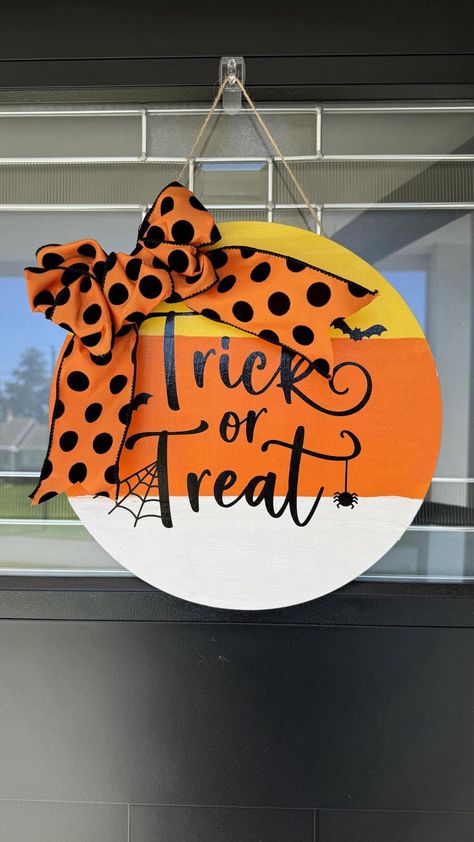 This is a 12" wooden circle door hanger.  Perfect for your front door, or inside on your closet door, bathroom door, bedroom door, inside garage door or simple a wall decoration.  It reads "Trick or Treat" and is painted in candy corn colors.  The bow is orange with black polka dots.  Perfect addition to your Halloween decor! This is already made and ready to ship to your home today! Wooden Circle Door Hangers, Office Door Signs, Pvc Door, Door Hangers Diy, Baby Shower Woodland Theme, Halloween Door Decorations, Painted Plates, Halloween Door, Woodland Theme