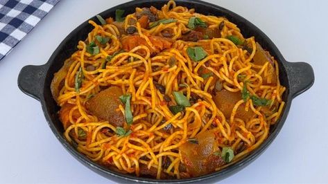 NATIVE SPAGHETTI JOLLOF | NATIVE SPAGHETTI JOLLOF | By Rozy's Kitchen | Facebook | Hi, everyone. Thank you for tuning in. Today's recipe, I am sharing with you how to make palm oil spaghetti or native spaghetti. For this recipe, I'll be using some fresh tomatoes, peppers, onions. I'll start by blending them. You can also slice them as well. And that is done. Next, in the pan, I'll add some red palm oil. Once the oil is hot, I'll add sliced onions. Give it a stir. I'll be frying the onions for 2 Jolly Spaghetti, Jamaican Spaghetti, Nigerian Spaghetti Recipe, Bobby Flay Spaghetti Sauce, Jim’s Spaghetti Sauce, Red Palm Oil, Palm Oil, Fresh Tomatoes, Spaghetti