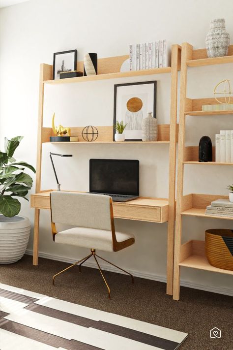 A mid-century modern home office with rustic styling. Living Room Office Desk Ideas, Bookshelf With Hidden Desk, Leaning Desk Small Spaces, Home Office Shelves Above Desk, Ladder Desk Small Rooms, Ladder Desk Decor, Compact Desk Ideas, Studio Apartment Desk, Working Space In Living Room