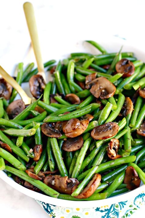 Sauteed Fresh Green Beans with Mushrooms is a delicious and healthy side dish. This easy vegan and gluten-free recipe is perfect for both weeknights and holidays. #greenbeans #mushrooms #sidedish #vegan #vegetarian #glutenfree #healthy #easy #recipe #thanksgiving #christmas #holidays Fresh String Beans Recipe, Green Bean And Mushroom, Green Beans With Mushrooms, String Bean Recipes, Green Beans And Mushrooms, Vegan Thanksgiving Menu, Traditional Green Bean Casserole, Thanksgiving Vegan, Roasted Fall Vegetables