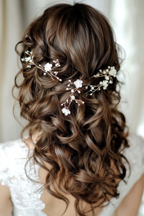 Flowers make every hairstyle magical, and these 51 bridal hairdos are proof. Featuring everything from dainty floral pins to full flower crowns, these ideas are designed to make you shine. No matter your theme, there’s a floral hairstyle perfect for your big day. See them all now! #bridalaccessories #flowerdecorations #weddinghairtrends Wildflower Wedding Hair Piece, Hair With Flowers In It, Bridal Hairstyles With Flowers, Long Brown Curly Hair, Bridal Hairdos, Flower Hairstyles, Floral Hairstyle, Floral Wedding Crown, Hairstyles With Flowers