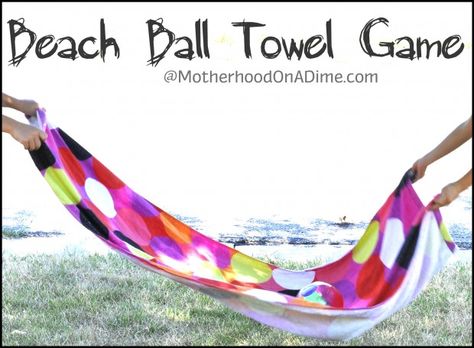 beach ball/ water balloon towel game. Use  1 towel to see how many times 2 players can toss up ball and catch it in the towel. or have each player with his on towel trying to catch the water balloon. Beach Ball Volleyball, Beach Games Kids, Beach Games For Adults, Beach Party Games, Beach Ball Games, Summer Fun For Kids, Beach Games, Games Party