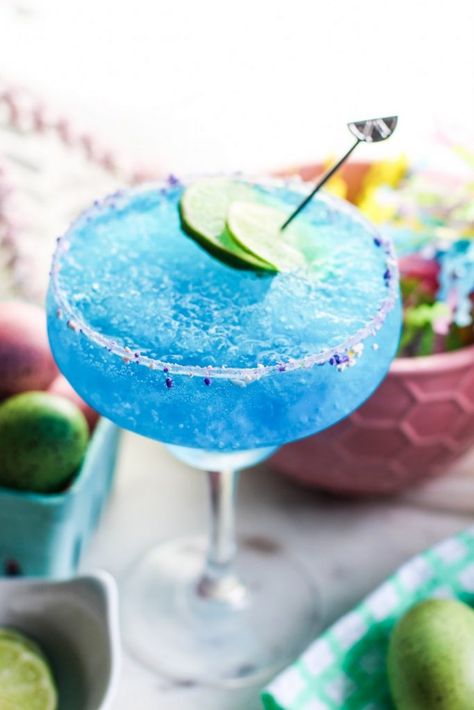 This Virgin Blue Margarita is a fun and refreshing drink to help you cool off all summer long. If you are looking for a non-alcoholic beverage to serve at your summer parties and backyard barbecues, you have found the perfect one! Virgin Margarita, Summer Drinks Nonalcoholic, Virgin Drinks, Blue Margarita, Easy Alcoholic Drinks, Margarita Ingredients, Mojito Mocktail, Summer Drinks Alcohol, Party Drinks Alcohol