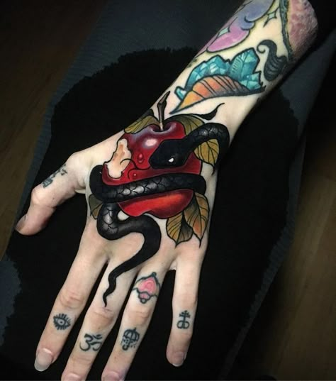 Forbidden Fruit by Matt Truiano, an artist at No Idols NYC. Traditional Hand Tattoo, Apple Tattoo, Feminine Skull Tattoos, Fruit Tattoo, Tattoo Japanese, Insect Tattoo, Wicked Tattoos, Tatuaje A Color, Piercing Ideas