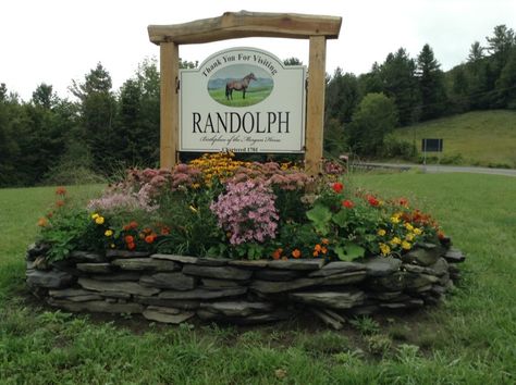 Garden club of Randolph, VT planted a beautiful display in front of the Timber Frame welcome sign Garden Signage Ideas, Sign Landscaping Ideas, Farm Signs Entrance Driveways, Iowa Homestead, Farm Signs Entrance, Driveway Landscape, Driveway Sign, Driveway Entrance Landscaping, Business Signs Outdoor