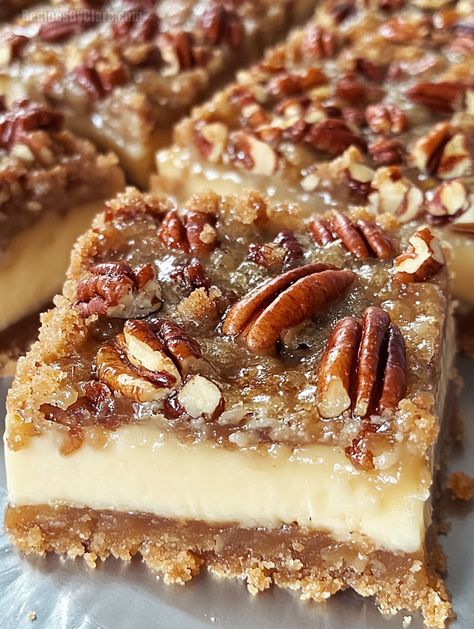 These Pecan Pie Cheesecake Bars combine a buttery graham crust, creamy cheesecake, and a sweet pecan topping for a delightful dessert. Easy Pie Dessert Recipes, Thanksgiving Recipes For Dessert, Pecan Pie No Bake Cheesecake Bars, Thanksgiving Desserts With Pecans, Easy Pecan Pie Cheesecake Bars, Pecan Pie Bars Natashas Kitchen, Pecan Cream Cheese Bars, Cheesecake With Pecan Pie Topping, No Bake Pecan Cheesecake Bars