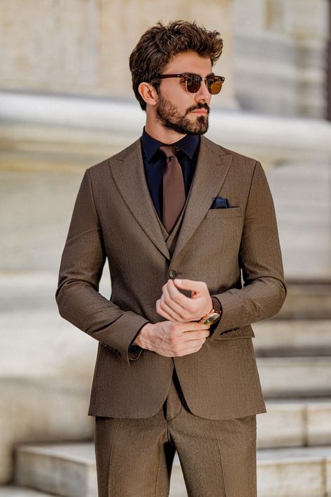 Elevate your formal attire with the Brown Slim-Fit Suit 3-Piece. This suit’s rich brown color and sharp, tailored fit provide the perfect balance of tradition and modernity, ensuring you stand out in any setting.  #brownslimfitsuit #elegantmenswear #classylook #formalfashion #modernfit #tailoredsuit #professionalstyle #sharpdressing #businessattire #menssuit Brown Suit Combinations Mens Fashion, Black And Brown Suit, Brown Suit Outfit, Brown Suit Men, 2 Piece Suit For Men, Wedding Guest Outfit Men, Brown Suits For Men, Urdu Vocabulary, Formal Attire For Men