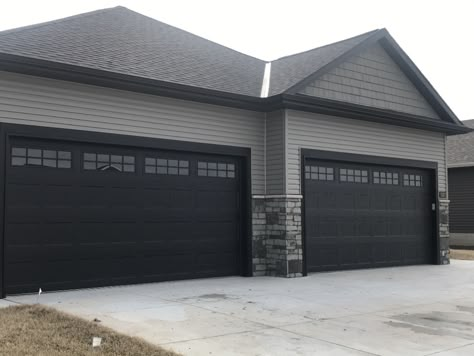 Dark Garage Doors Grey House, Grey Black House Exterior, Grey Brick Exterior House, Black Garage Doors Grey House, Gray House Black Garage Door, Houses With Black Garage Doors, Grey And Black Exterior House, Grey And Black House Exterior, Charcoal Garage Door