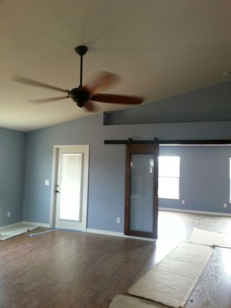 Living room. Wall color windy blue from Sherwin Williams Light Blue Basement Walls, Windy Blue Sherwin Williams, Basement Wall Colors, Windy Blue, Blue And Green Living Room, Basement Finish, Interior Paint Colors Schemes, Living Room Wall Color, Blue Gray Paint