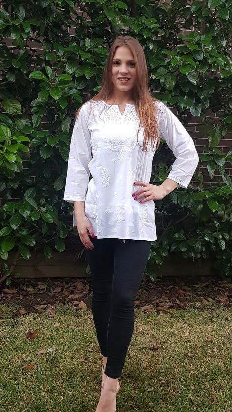 Tunic Tops With Jeans, Tunic Tops With Leggings, Hand Embroidered Tunics, Cotton Dresses Summer, White Tunic Tops, Long Kurti Designs, Desi Fashion Casual, Embroidered Tunic Top, White Tunic