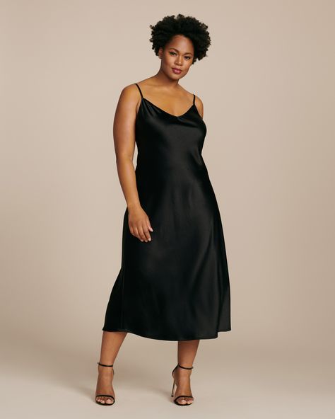 Made from a lustrous black satin, the “Cabaret” slip dress is cut on a bias to lightly skim curves. Adjustable straps frame the flattering V neckline. Fits true to size. Slip Dress Midsize, Slip Dress Plus Size, Apple Body Shape Outfits, Bias Slip Dress, Dresses For Apple Shape, Plus Size Wedding Guest Dresses, Dresses For Spring, Plus Size Dresses For Women, Best Wedding Guest Dresses