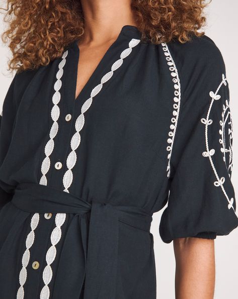 This new kaftan beach dress creates an easy yet stylish look for the warmer months to come. The dress features white contrast embroidery with a button through front and a tie waist belt to cinch you in. The length falls to maxi 50 inches. Embroidered Black Dress, Contrast Embroidery, Embroidered Kaftan, William Black, Black Embroidered Dress, Dressing Gown Robe, Shirt Dresses, Jd Williams, Denim Coat Jacket