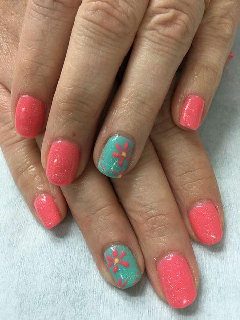 Sparkled Coral and sea foam flower accented gel nails Coral Sparkle Nails, Coral And Aqua Nails, Coral And Green Nails, Coral Nails With Flowers, Acrylic Flower Nail Designs, Pink Teal Nails, Coral Nails With Design Summer Sparkle, Coral And Mint Nails, Short Coral Nails