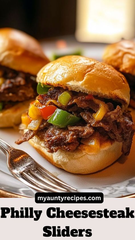 Savor the ultimate Philly Cheesesteak Sliders, loaded with juicy steak, melted provolone, and caramelized onions on buttery slider buns. Perfect for game day snacks or quick family dinners, these sliders bring authentic Philly cheesesteak flavors in a bite-sized treat. Quick to prep and packed with flavor, they’re a crowd-pleaser everyone will love. Try these cheesy, hearty sliders today! Philly Cheesesteak Sliders Recipe, Steak Sliders, Philly Cheesesteak Sliders, Cheesesteak Sliders, Slider Rolls, Philly Cheese Steak Sliders, Quick Family Dinners, Philly Cheese Steak Casserole, New Years Eve Food