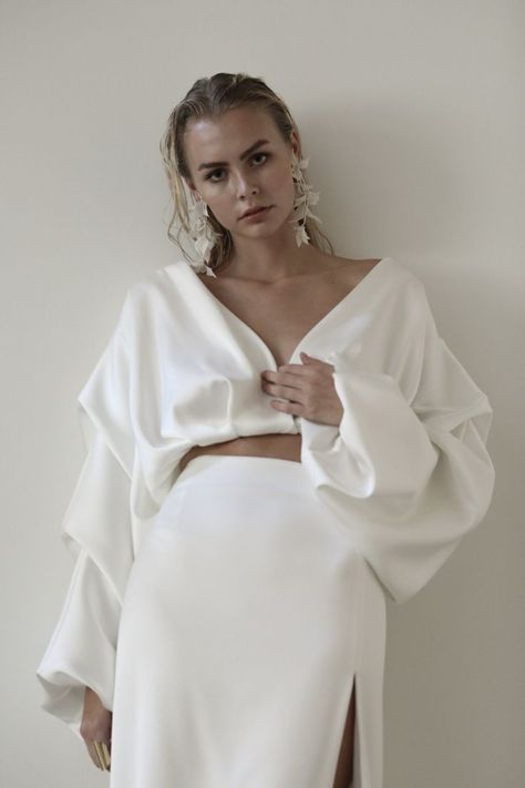 Looking for a bit more drama? Add tufts of tonal petals with chic + alluring organza texture to create the perfect balance of drama + subtility. Swept Back Hair, Modern Gown, Dramatic Earrings, Bridal Separates, Long Sleeve Gown, Infinity Dress, Bridal Sash, Bride Accessories, Dress Order