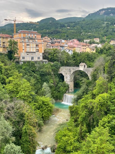 bridge with a blue green waterfall and lots of trees Ascoli Piceno Italy, Italy Scenery, Cliff Jumping Italy, Lake Region Italy, Italian Cliffside, Patalpani Waterfall, Cascade Del Mulino, Iceland, Bridge