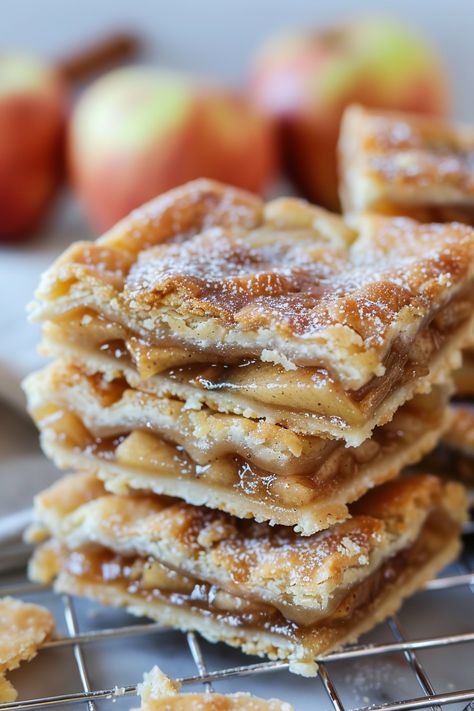 Buttery Apple Pie Bars with a Flaky Crust Caramel Apple Pie Bars Recipe, Apple Pie Blondie Bars, Pizza Dough Apple Dessert, Apple Pie Bits, Cookie Crust Deep Dish Apple Pie, Mini Apple Crisp Pies, Apple Pie Bars With Puff Pastry, Baked Apples With Pie Crust, Apple Pie Bars Ina Garten