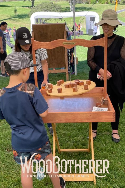 We provided a bunch of wooden games for the Play Festival in Auckland in April 2023. Here are some folks playing Counter Balance. Hire some games for your next event, see the full range on our website. Counter Balance Game, Fall Festival Games, Balance Game, Festival Games, Counter Balance, Giant Jenga, Entertainment Ideas, Wall Balls, Garden Games