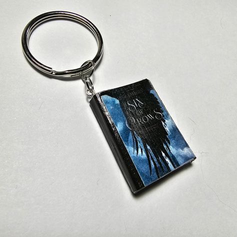 Six of Crows Mini Book Keychain https://etsy.me/3IYhHwl #sixofcrows #grishaverse #minibook #minibooks #keychains #bookkeychain #bookish #bookishgift #booklovers Six Of Crows Mini Book Cover, Six Of Crows Bookmark, Six Of Crows Hardcover, Mini Book Keychain, Bookish Jewelry, The Grishaverse, Crow Keychain, Book Keychain, Crow Books