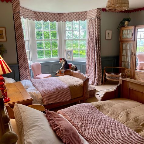 Katie founded Homes by Katie Cardew after training to become an interior designer in 2022. She tells us about her style and how she is bringing her 17th-century home back to life. How would you describe your interiors style? Colourful but also classic. I love mixing older items with newer pieces, like pairing antique f Edwardian Nursery, English Countryside Nursery, Victorian Childs Bedroom, Kit Kemp Bedroom, Katie Cardew, Classic Kids Bedroom, Half Tester Bed, Cotswolds Company Bed, Children's Room Design