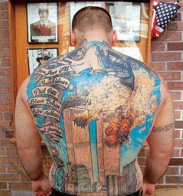 T.C. Cassidy, a Firefighter:  5 men in Tiernach Cassidy's firehouse died on 9/11. After 2 grueling months working at ground zero, he began to have their names--and the burning towers--emblazoned on his back. The tattoo, which took 9 months to complete, was therapeutic. "The pain in my back was good for the pain in my head," he says. Plus Cassidy, 34, married the tattoo parlor's receptionist. This image, by photographer Jonathan Hyman, is featured in the photo exhibit, "9/11: A Nation Remembers" Marine Corps Tattoos, Firefighter Tattoo, Fire Fighter Tattoos, Tribute Tattoos, Amazing Tattoos, Volunteer Firefighter, Memorial Tattoo, Bad Tattoos, Memorial Tattoos