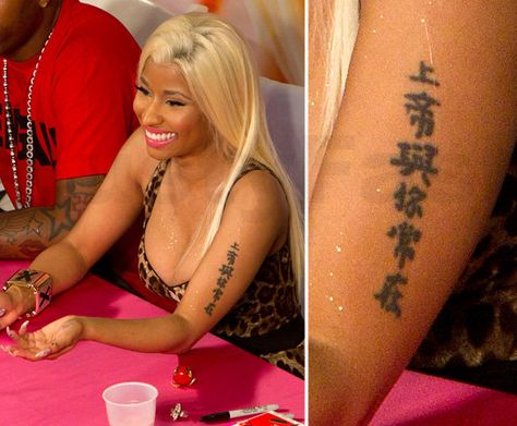 nicki minaj tattoo 2014 Nicki Minaj Tattoo, Tattoo Quiz, Celebrity Tattoos Women, Fan Tattoo, Hand And Finger Tattoos, Chinese Tattoo, Upper Arm Tattoos, Pink Friday, New Boyfriend