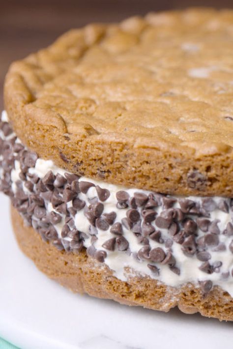 This is the biggest, most delicious, chocolate chip cookie sandwich you've seen. Bigger DOES mean better. Cookie Sandwich, Ice Cream Cake Recipe, Giant Chocolate, Ice Cream Cookie Sandwich, Chocolate Chip Ice Cream, Cream Cakes, Salty Cake, Cream Sandwich, Ice Cream Cookies