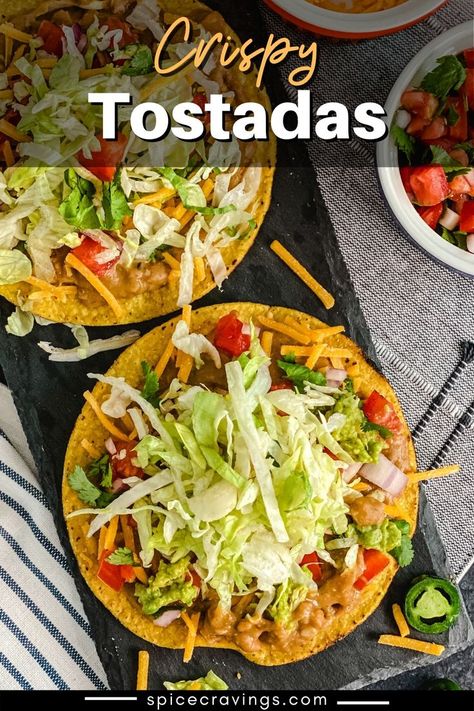 1 reviews · 15 minutes · Vegetarian Gluten free · Serves 4 · Crispy, crunchy corn tortillas topped with refried beans, cheese, salsa, guacamole and lettuce, these Mexican Tostada are a party of flavors. #tostadas #mexicanrecipes #vegetarianrecipes Taco Bell Tostada, Chirozo Recipes, Guacamole Tostadas, Crunchy Corn, Canning Refried Beans, Tostada Recipes, Homemade Refried Beans, Homemade Beans, Salsa Guacamole