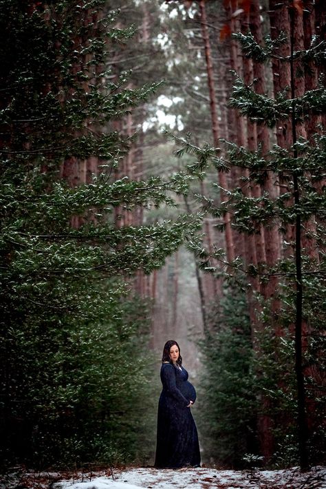 Winter Maternity Session in Forest with Navy Blue Maternity Gown Dark Maternity Pictures, Brandy Photoshoot, Dark Maternity Shoot, Outside Winter Maternity Photos, Winter Time Maternity Photos, Winter Forest Maternity Shoot, Moody Outdoor Maternity Photos, Winter Maternity Photography, Winter Pregnancy Photoshoot