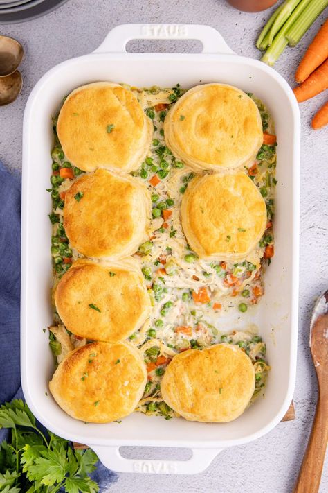 Easy chicken pot pie casserole checks all the boxes - comforting, filling, and satisfying. Made easy with canned biscuits, chicken, peas, carrots, and celery you really can't ask for a better weeknight dinner! Easy Chicken Pot Pie Casserole, Chicken Pot Pie Recipe With Biscuits, Chicken Peas, Easy Chicken Pot Pie Recipe, Pot Pie Casserole, Carrots And Celery, Chicken Pot Pie Filling, Mexican Chicken Casserole, Chicken Pot Pie Casserole