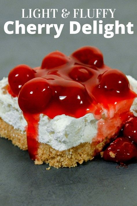 This no bake cherry delight dessert is perfect for beginners and is very quick to make. You can throw it together in about 10 minutes! Cherry delight is made with cool whip and cheesecake so it's nice and creamy with a graham cracker crust. Soo good! Cherry No Bake Dessert, Dessert Made With Cool Whip, Cheesecake Cool Whip Recipes, Dream Whip Cheesecake, No Bake Cherry Dessert, Easy Desserts Using Cool Whip, Cherry Dream Whip Dessert, Cherry Yum Yum Recipe Easy, Dream Whip Cherry Delight