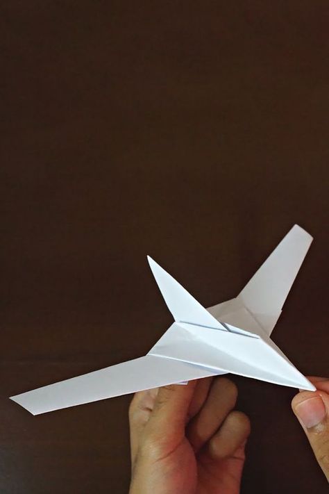 This video will show how to make an easy paper fighter jet airplane that fly far. To make this Origami airplane watch full video and follow the instructions that i show step by step. Beginners can make this simple paper jet plane with easily. So i hope this video tutorial will help you to make an origami plane out of colors paper. #origamijet #papertoyplane #paperplane Origami Jet Fighter, Paper Airplane Steps, Paper Jet, Best Paper Plane, Plane Crafts, Origami Plane, Origami Airplane, Paper Airplane Models, Make A Paper Airplane