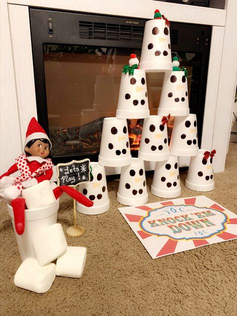 Snow ball knock them down game Elf On The Shelf Snow Ball, Elf Snowball Toss, Elf On The Shelf Snowball Toss, Elf On The Shelf Snowball, Elf On The Shelf Snow, Snowball Games, Snowball Toss, Awesome Elf On The Shelf Ideas, Snow Ball