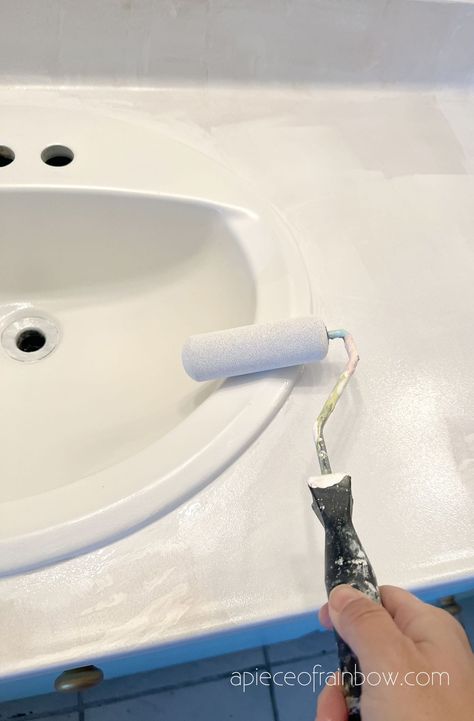 How to paint bathroom countertop & sink, and refinish old formica or laminate vanity top into white or marble finish. Great idea for a super easy budge remodel! - A Piece of Rainbow, D}Y, home improvement, fixer upper, remodeling, before after, modern, farmhouse, boho, interior design, transformation Paint Bathroom Countertop, Painting Bathroom Sinks, Paint Bathroom Vanity, Laminate Vanity, Painting Bathroom Countertops, Counter Top Sink Bathroom, Paint Bathroom, Painted Vanity Bathroom, Bathroom Vanity Countertop