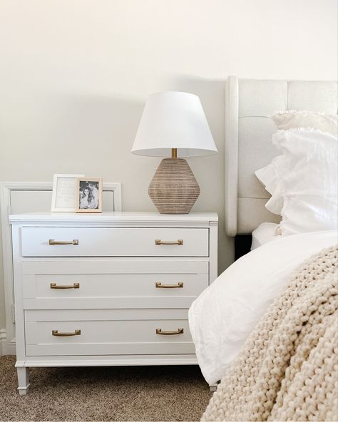 White Wide Nightstand, White Bed Nightstand Ideas, Lamps For White Nightstand, Nightstand With White Bed, White Nightstand Bedroom Decor, White Nightstands Bedroom, White Bedroom Nightstands, King Bed Nightstand Ideas, Dresser As Nightstand Master Bedrooms