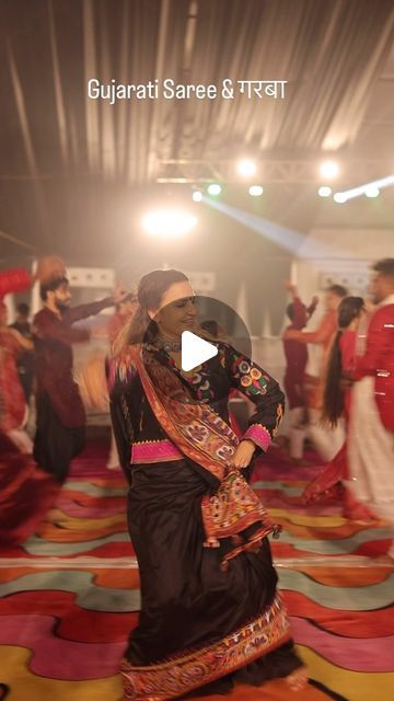 Rupal Mitul Shah on Instagram: "Played garba with @mahaul_py group  with a dad son duo @jagdishpurohit1970 @burgundy_ya_maroon 
Saree by @shri_hetu 
Jewellery by @vanijewels_byvaidehi 
Jacket by @mannslegacy" Maroon Saree, Dad Son, Saree, On Instagram, Instagram