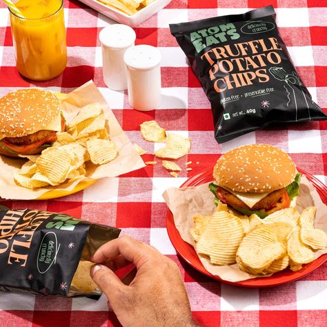 Tired of the same old boring fries with your burgers? Get ready to be amazed! Atom Eats truffle potato chips are here to take your snacking experience to the next level. With their rich truffle flavour and irresistible aroma, these chips are a perfect match for any burger. Crunchy, flavourful, and absolutely delicious, these ruffle-cut chips will satisfy your cravings and leave you wanting more. So, ditch the ordinary and grab a packet of Atom Eats truffle potato chips today. Your taste b... Truffle Potato Chips, Gluten Free Potato Chips, Potato Chips, Truffles, Atom, Perfect Match, The Ordinary, Potato, Gluten Free