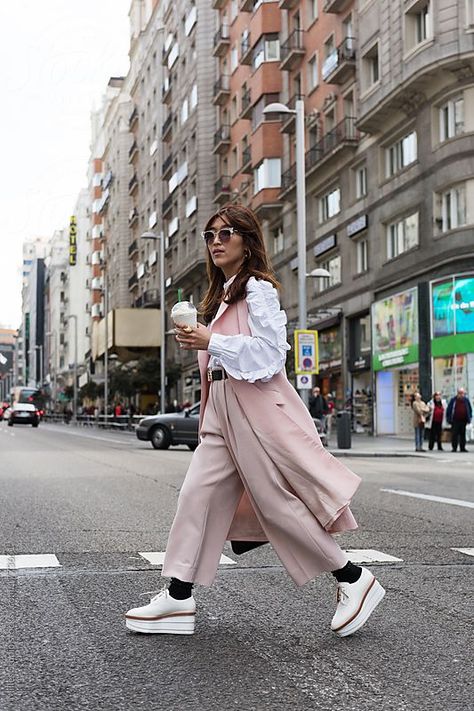 Classy model with coffee walking down street by Milles Studio for Stocksy United. Fashionable woman in stylish clothing strolling with cup of coffee on street. Street Fashion Photoshoot, Woman Photos, Street Photoshoot, Walking Poses, City Photoshoot, Walking Women, Fashion Walk, Curvy Hips, Photography Editorial