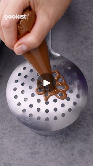 11M views · 151K reactions | 3 simple and ingenious chocolate ideas to decorate your ice cream and desserts
INGREDIENTS
Dark melted chocolate 
White melted chocolate 
Ice cream 
Pistachio grains 

METHOD
1. For the first decoration, add melted chocolate onto the skimmer, dip it into the ice water, then decorate the ice cream. 
2. For the second decoration put a skewer onto the parchment paper and top it with melted chocolate making many circles, and sprinkle with pistachio grains.
3. Refrigerate for 20 minutes and decorate the ice cream. 
4. For the third decoration top dark melted chocolate with white chocolate spiral and draw the rays from the center of the chocolate. Decorate the ice cream. | Cookist Wow | Cookist Wow · Original audio White Chocolate Decorations For Cake, Ice Cream Pistachio, Frozen Yogurt Popsicles, Chocolate Bowl, Cookist Wow, Chocolate Ideas, Chocolate Work, Chocolate Garnishes, Vegan Candies