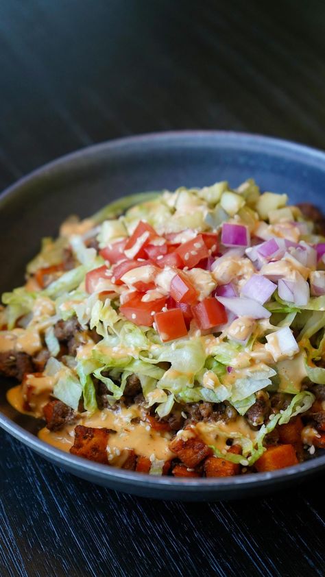 Cal Reynolds | Sweet Potato Burger Bowl 🍠 🍔🔥 Let me start by saying, this had no business being so damn good. If you love burgers... this is for you!… | Instagram California Burger Bowl, Burgers And Sweet Potato Fries, Sweet Potatoe Burger Bowls, Burger Bowls With Sweet Potato, High Protein Delicious Meals, Burger Bowls With Potatoes, Sweet Potato Hamburger Bowl, Sweet Potato Burger Bowl, Sweet Potato Taco Bowls