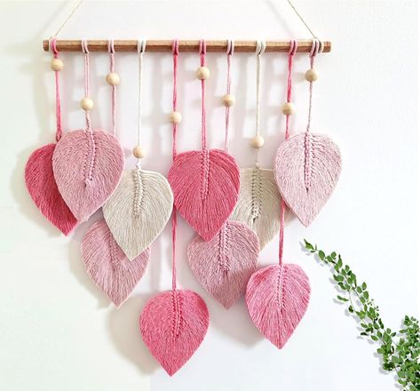 PRICES MAY VARY. HANDMADE AESTHETIC WALL DECOR Our Leaf Boho Macrame Wall Hangings are an ideal wall art for Boho Home Decor for Wall Hangings for Living Rooms, Wall Hangings for Bedrooms and general Pink Wall Hanging Decor SPIRITUAL BOHEMIAN VIBES The handmade yarn Macrame Wall Art will enhances the spiritual aesthetics of your house. Our olive green and Sage green Macrame Wall Decor will spread positive vibes in your bedroom, living room, office and dorm POSTIVE DECOR FOR EVERY WALL Our Handma Macrame Wall Hanging Leaves, Spiritual Aesthetics, Hanging Leaves, Yarn Macrame, Green Macrame, Macrame Style, Boho Yarn, Boho Apartments, Crochet Wall Art