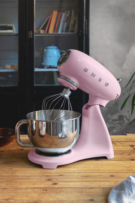 Tent up? Paul Hollywood in place? The Great British Bake Off is back and we've got the bug. Our sublime retro stand mixer was made for moments like this and right now all SMF02 and SMF03 models come with £50 cashback. #Smeg #SmegUK #SMF02 #SMF03 #GBBO #BakeOff #GreatBritishBakeOff #RetroStandMixer #SmegKitchen #TechnologyWithStyle #BakingTips Pink Smeg Appliances, Mixer Aesthetic, Smeg Mixer, Smeg Aesthetic, Kitchen Appliances Set, Pink Smeg, Smeg Stand Mixer, Smeg Kitchen Appliances, Colorful Minimalism