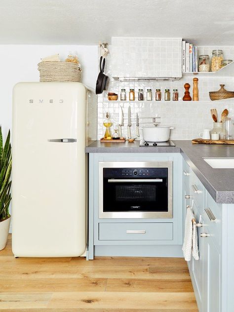 Retro Smeg refrigerator in blue kitchen Smeg Refrigerator Kitchen, Smeg Refrigerator, Vintage Fridge, Boho Apartment, Smeg Fridge, Polar Opposites, Bold Boho, Pastel Kitchen, Beach Rental